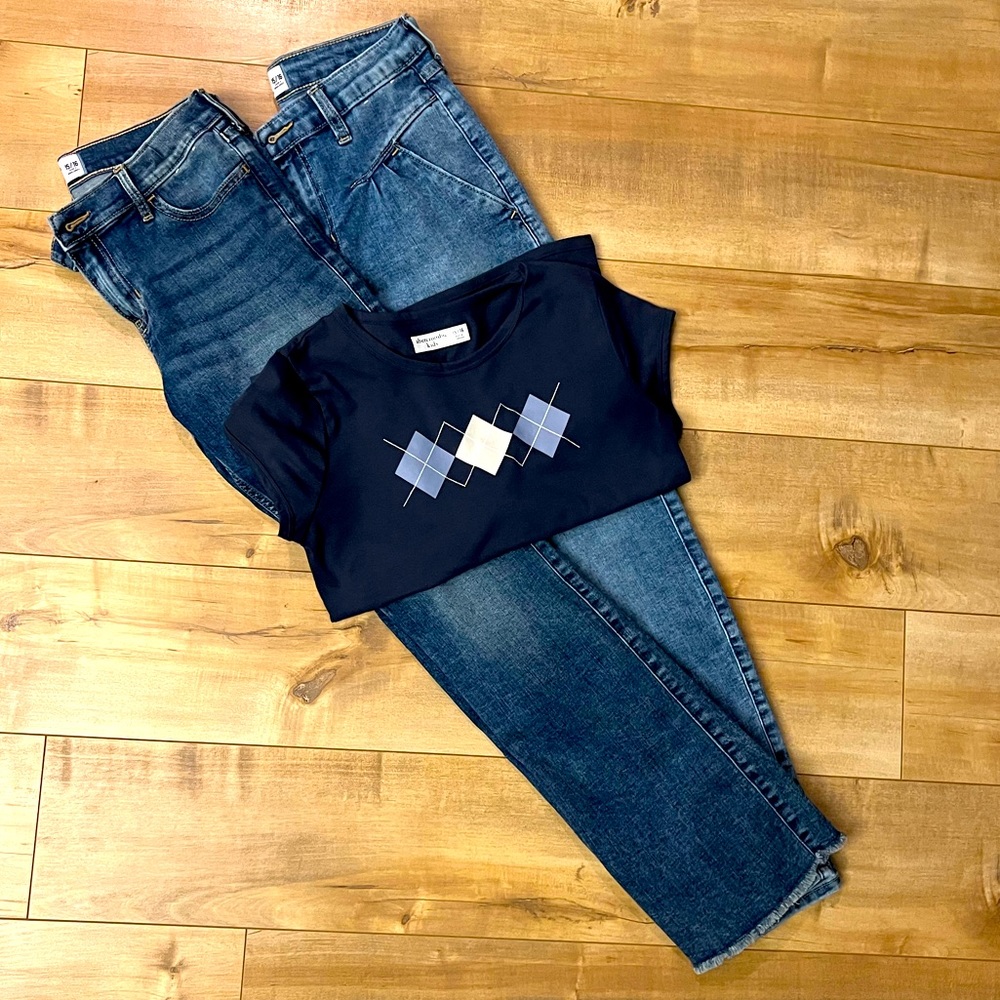 Abercrombie kids: Navy short sleeve top and 2 pairs of jeans.